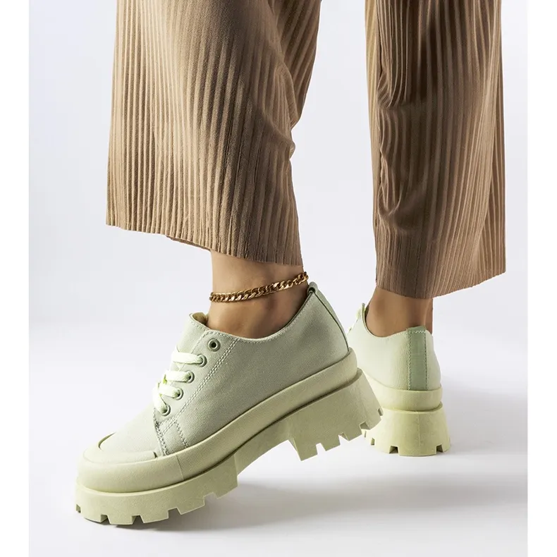 Green shoes with a massive Pointe sole