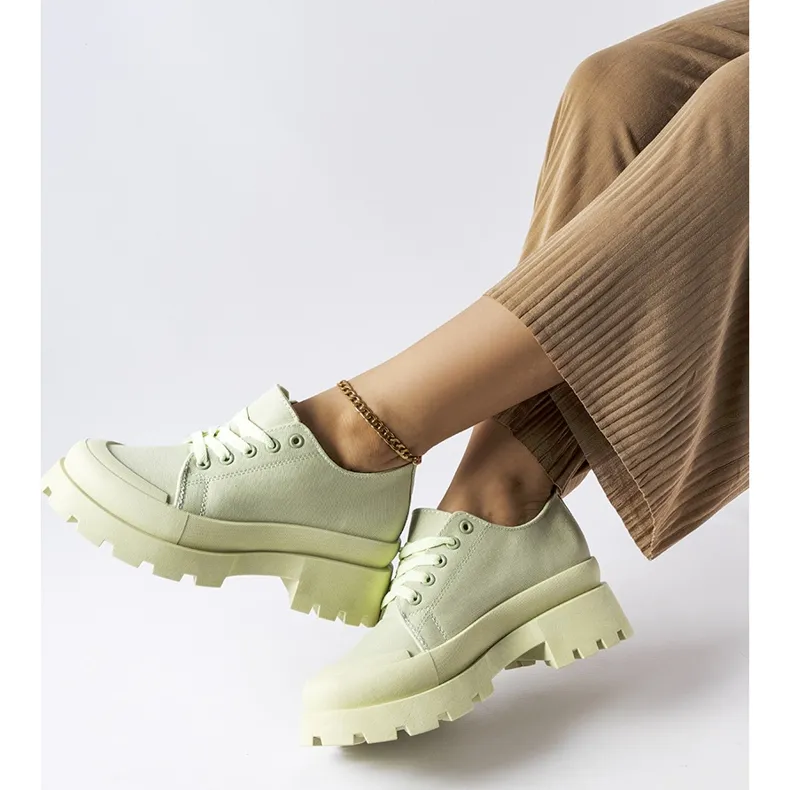 Green shoes with a massive Pointe sole