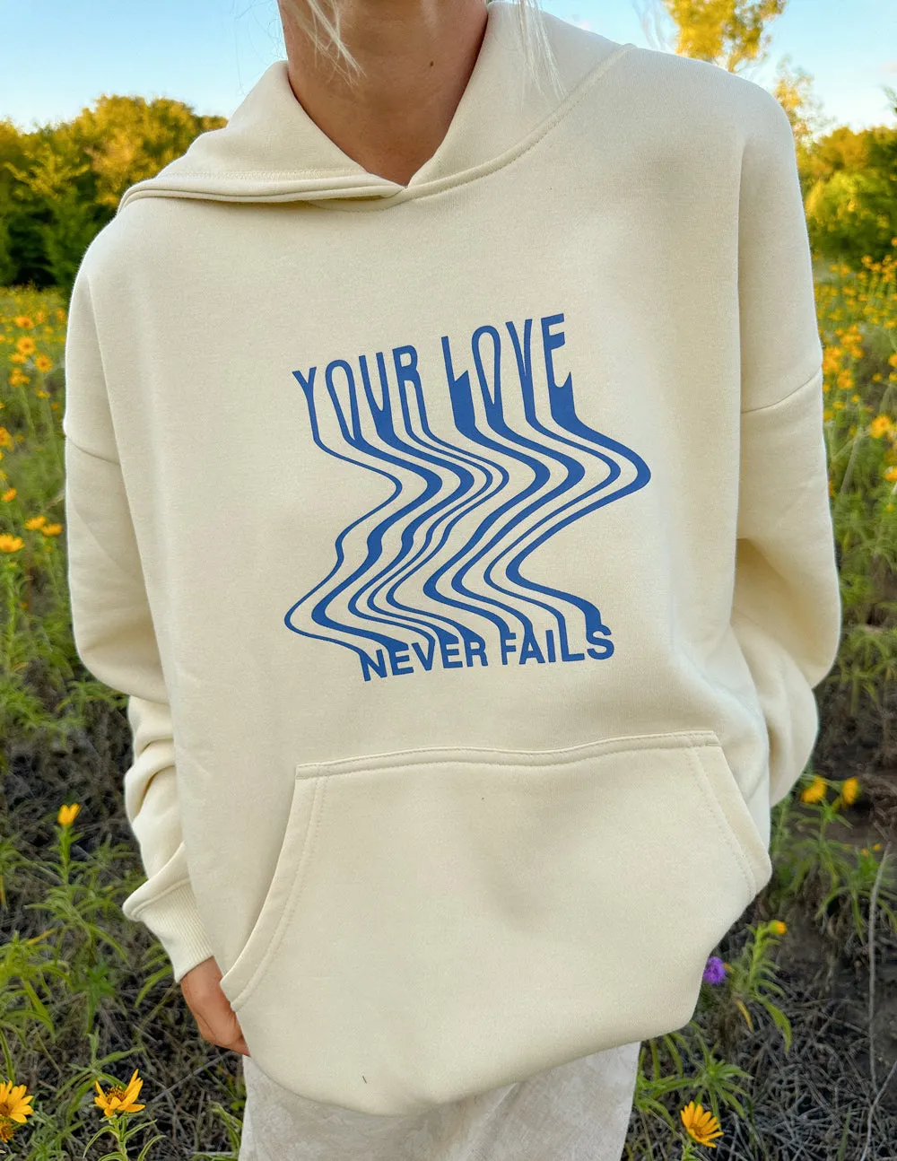 Love Never Fails Cream Unisex Hoodie