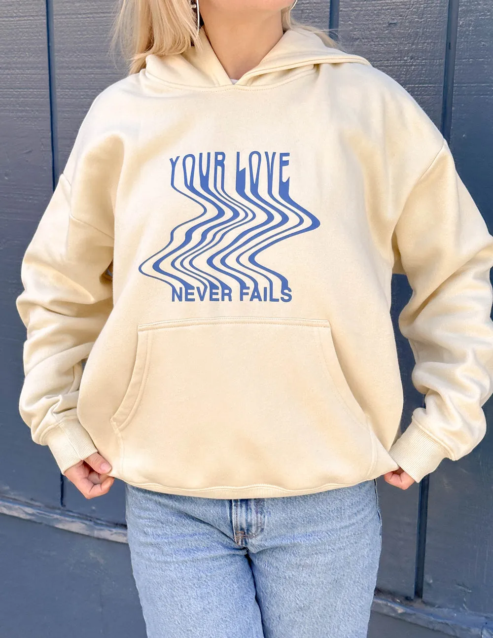 Love Never Fails Cream Unisex Hoodie