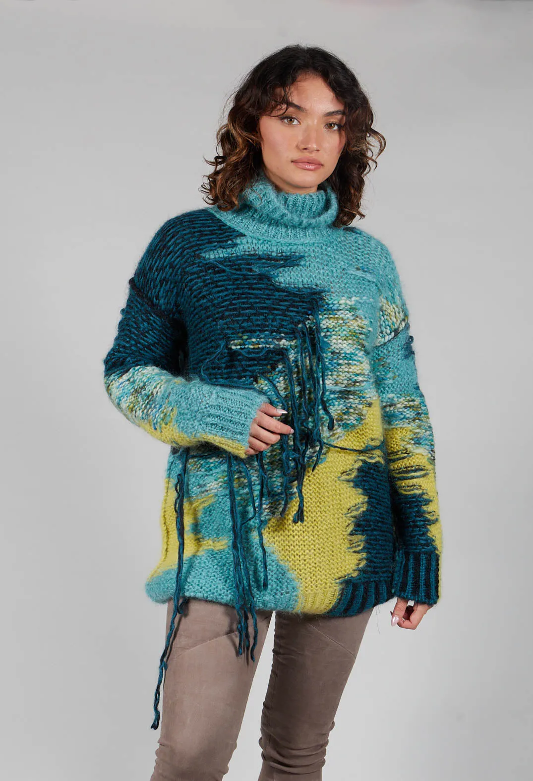 Roll Neck Jumper with Fringe Detail in Turquoise